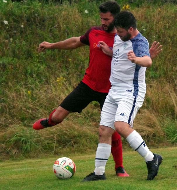 Ben John put under pressure in the clash between Clarbeston Road versus Fishguard Sports. Picture Gordon Thomas